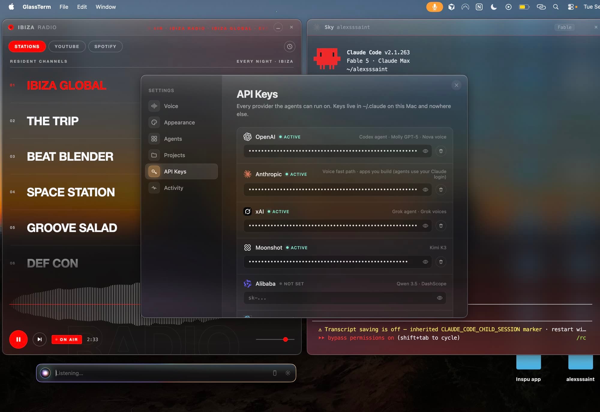 GlassTerm running: a radio card on the left, an agent pane on the right with a Claude Code session in it, the Settings window open on API Keys, and the voice bar at the bottom reading Listening.